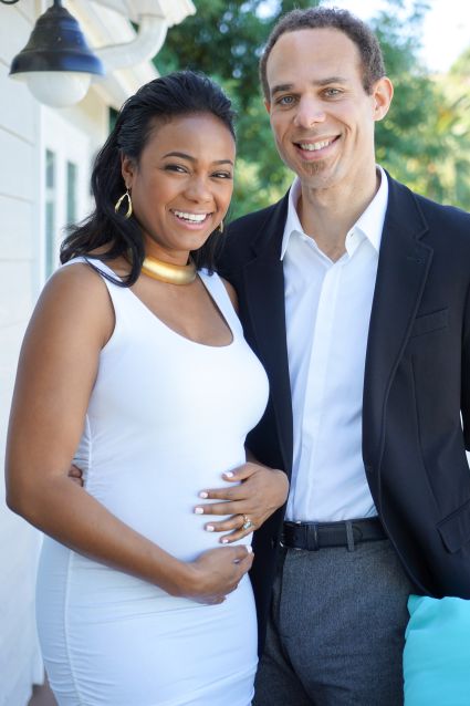 Tayana Ali photographed with her baby bump and new beau!