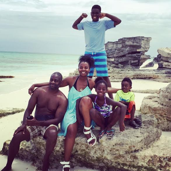 Beach babes: The Montgomery Family surround Candace on vacay in Turks and Caicos.