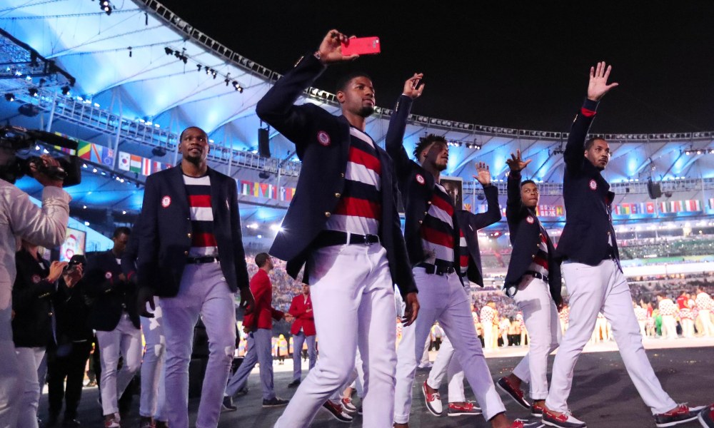 Aug 5, 2016; Rio de Janeiro, Brazil; USA basketball players Kevin Durant , Paul George , Jimmy Butler and Carmelo Anthony during the opening ceremonies for the Rio 2016 Summer Olympic Games at Maracana. Mandatory Credit: Rob Schumacher-USA TODAY Sports ORG XMIT: USATSI-323234 ORIG FILE ID: 20160805_jel_usa_181.jpg